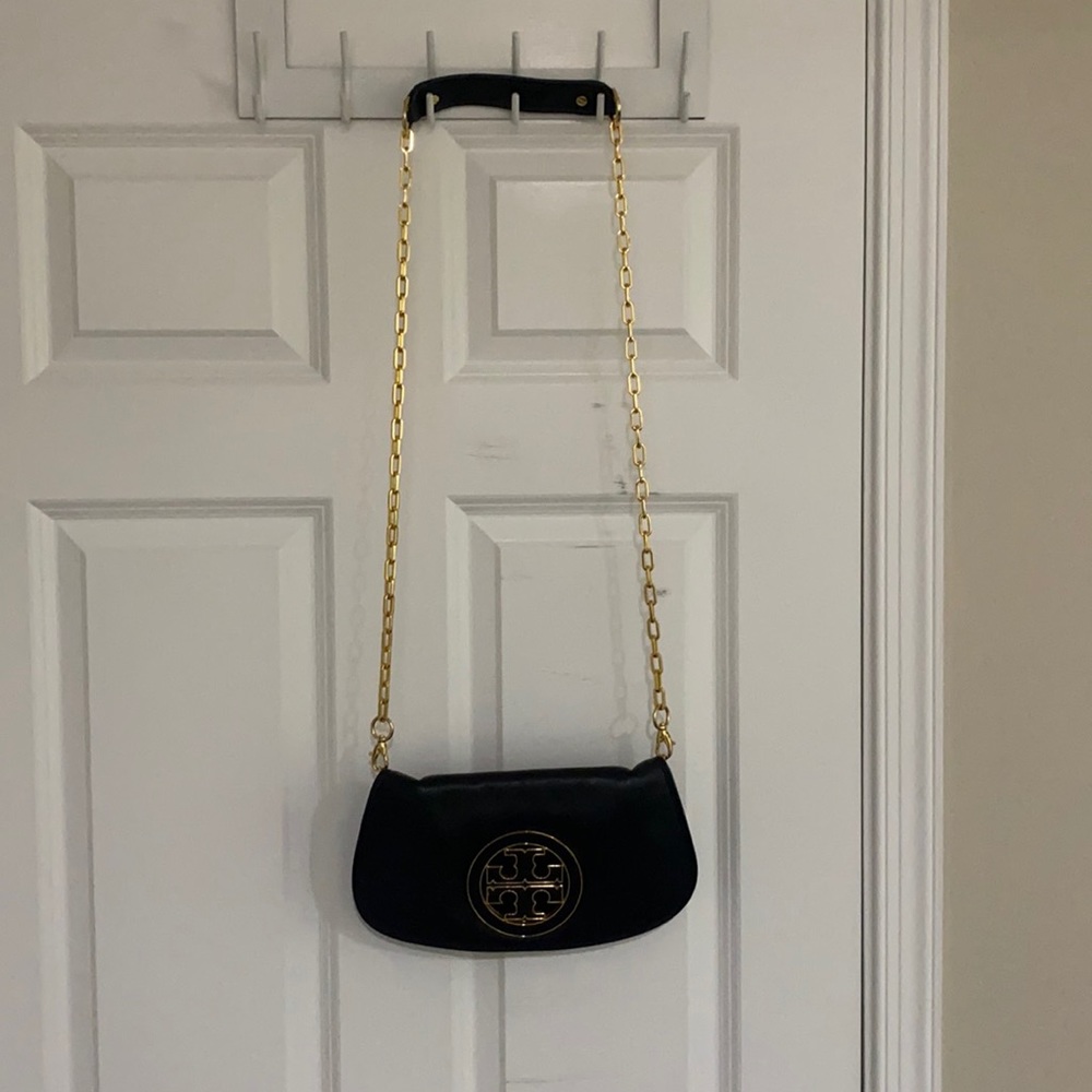 Black Tory Burch clutch, good condition